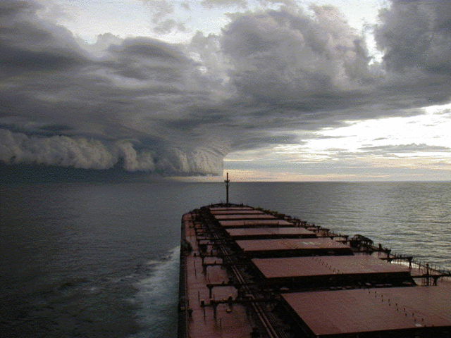 Iron ore carrier heading into a storm off Pilbara Coast